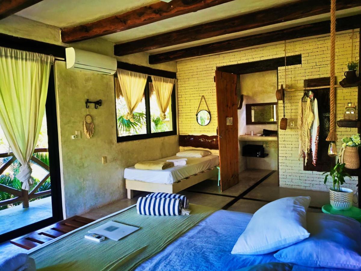Отель La Casa De Mia Тулум Экстерьер фото